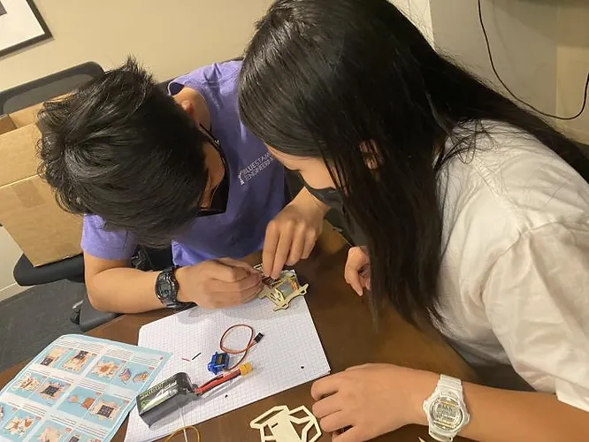 Students building remote-control projects at MissionRC